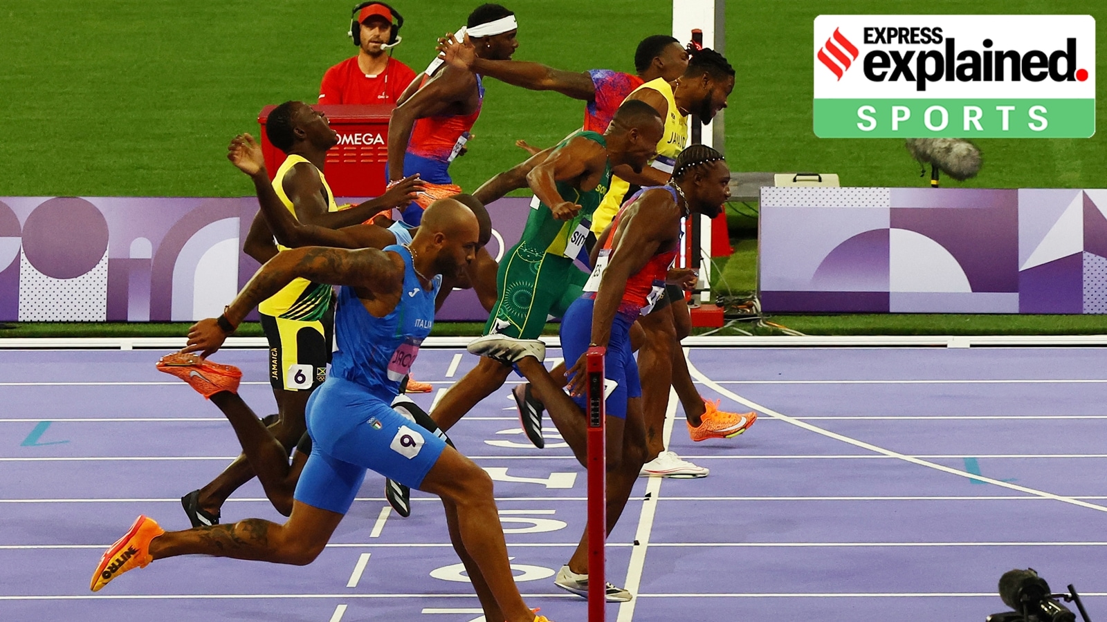 Photo finish Lyles in red and blue is seen leaning forward at the line. Reuters 1746494451