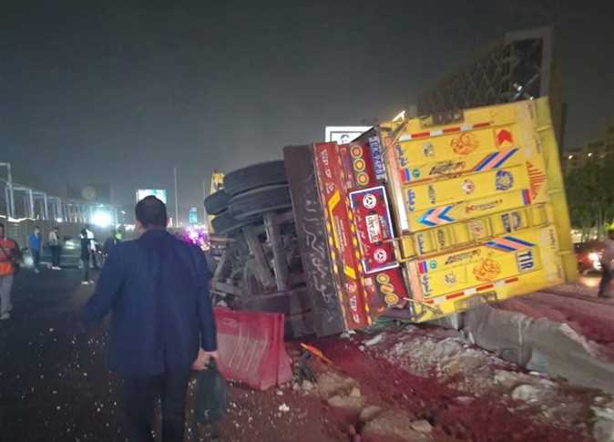 heavy duty truck trailer collided with seven private cars on the Ring Road in Maadi