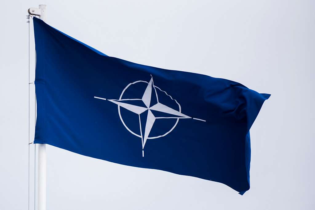 the nato flag flies during a ceremony at camp butmir 633b16 1024