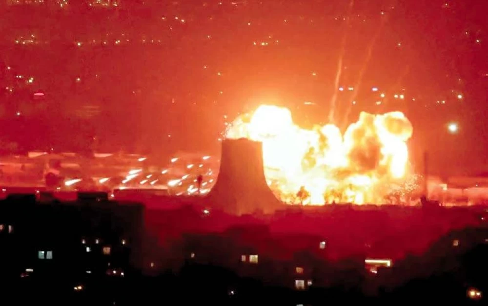 Massive explosion reported following a strike near the Azadi Tower in close proximity to Tehrans Mehrabad International Airport